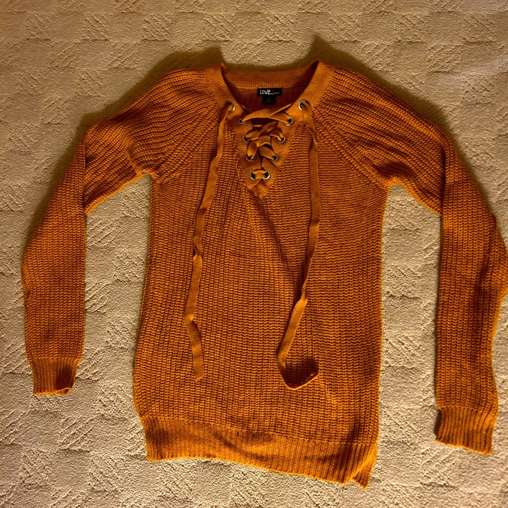 Orange knitted sweater
